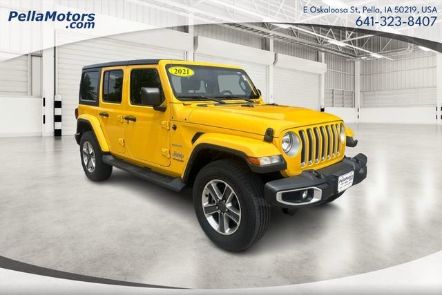 2021 Jeep Wrangler Unlimited Sahara in Yellow — front three-quarter view