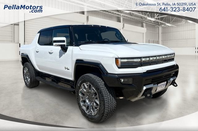 2025 GMC HUMMER EV Pickup 3X in Interstellar White — front three-quarter view