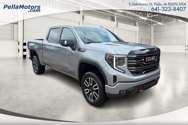 2026 GMC Sierra 1500 AT4 in Sterling Metallic — front three-quarter view